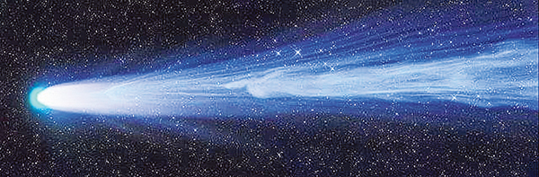 Blazing comet tail is whipped by solar winds