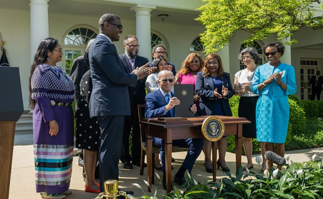 U.S. President signs executive order on environmental justice to improve lives hit by toxic pollution & climate change