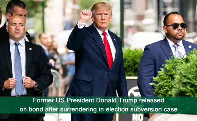 Former US President Donald Trump released on bond after surrendering in election subversion case