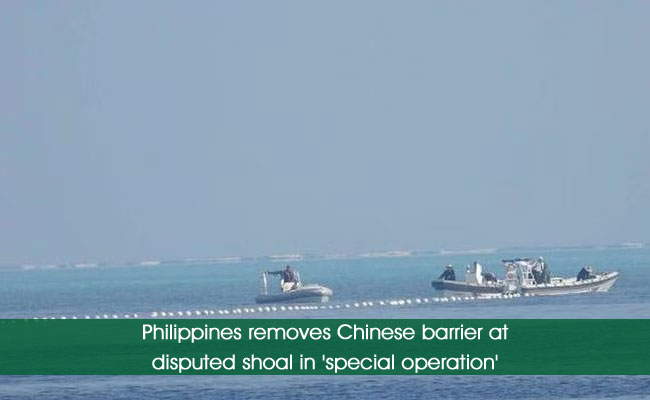 Philippines removes Chinese barrier at disputed shoal in 'special operation'