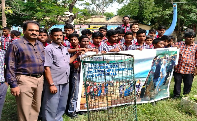 Principal of Kendriya Vidyalaya participating in cleanliness drive. Students actively participating in the cleanliness program. Principal with students participate in Swachh Program,Cleaned premises after the cleanliness drive.