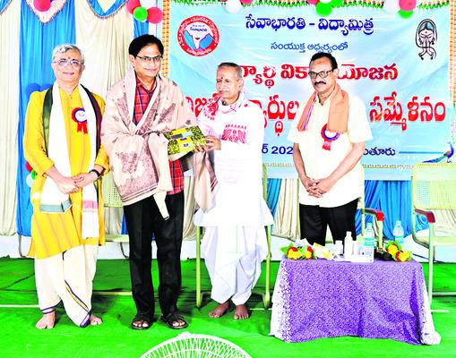 Students participating in the Student Development Program at Chintoor.Dr. Gangadhar Prasad gets felicitated by Seva Bharati Organization, Seva Bharati's commitment to supporting children highlighted by the President.