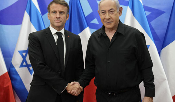 French President Emmanuel Macron meets with Israeli Prime Minister Benjamin Netanyahu in Tel Aviv