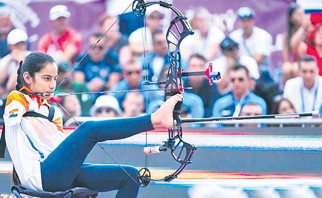 Indian archer Sheetal Devi makes history with two gold medals at the Asian Para Games 2023., Sheetal Devi scored hat-trick medals Asian Para Games 2023, heetal Devi holding two gold medals, celebrating her historic win in archery at Asian Para Games 2023.,