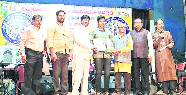 Celebrating success in Telugu talent competition. State-level recognition for Telugu talent.,Satya Swaroop receiving award in Hyderabad, Talented Marupaka student at the state level event.,