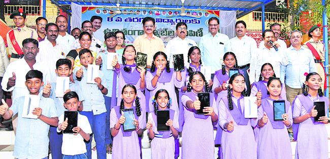 CM YS Jagan Mohan Reddy supports education with tablet distribution  Distribution of tabs to students   CM YS Jagan Mohan Reddy distributing tabs to Chinthapalli GTWH School students  