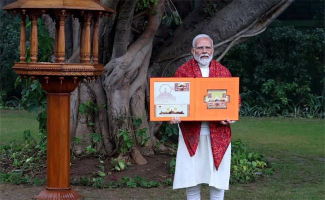 Prime Minister Modi unveiling Sri Rama Janmabhoomi Temple stamp   Ayodhya Ram Mandir Updates   PM Modi releases stamps on the occasion of Ram Lalla's pranapratistha.