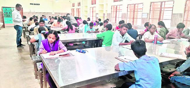 Entrance exam by students for admission at Navodaya School    Principal's statement: Navodaya entrance exams conducted peacefully  Successful Navodaya entrance exams: Principal confirms peaceful conduct.    Navodaya entrance exams: Students attend peacefully.