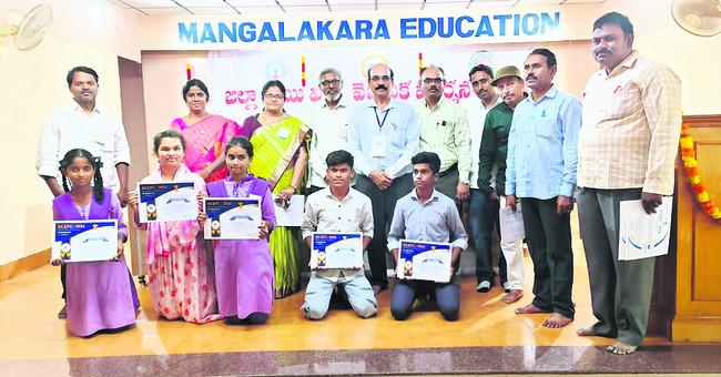Students received appreciation certificate      Innovative ideas on display at Puttaparthi Mandal exhibition       Students presenting science projects at district-level exhibition   