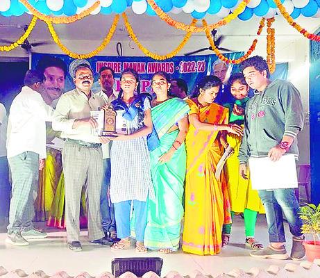 Renigunta Mandal, Gajulamandyam student selected for Inspire Manak-2023-24 state-level competition.  P. Meghana receives the prize and certificate for selecting to state level Inspire competitions