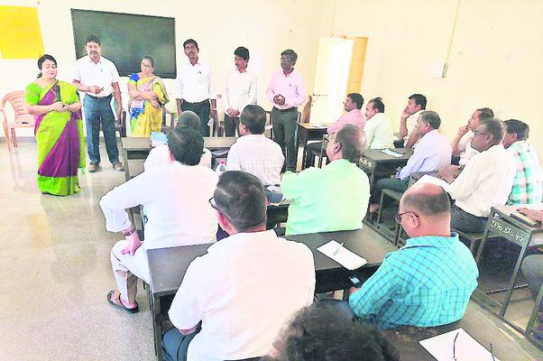   Government school inspection for educational quality   Quality education initiative in Bukkarayasamudra schools  State Academic Monitoring Officer Kalpana Saila speaking to the teachers