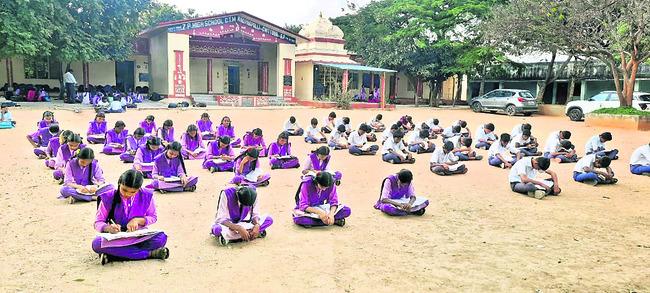 Students of tenth class studying in study hour