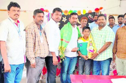 Sri Chaitanya school management appreciating Satvik Varanya for his achievement