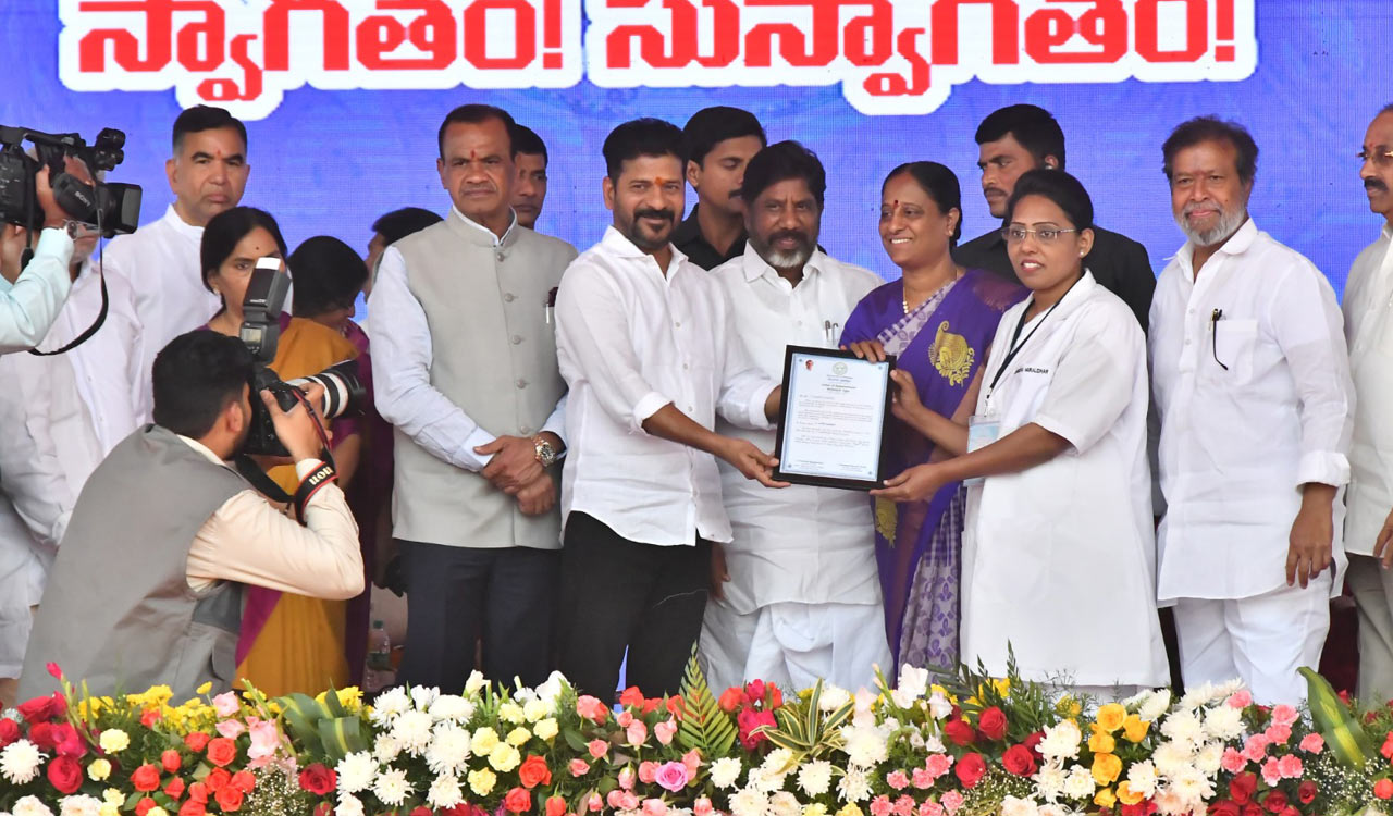 Staff nurses working diligently in hospitals for three months without payment  staff nurse salaries problems in telangana   Chief Minister Revanth Reddy handing over appointment papers to staff nurses at LB Stadium  