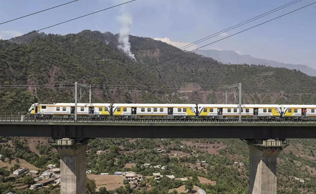 Train engine on Chenab Railway Bridge during first trial run   First trial run on World's Highest Railway Bridge  Chenab Railway Bridge in Jammu and Kashmir ready for traffic 