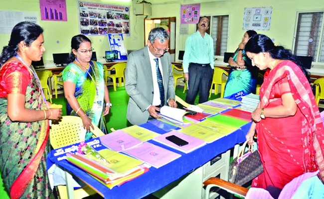 NAAC visits Government Degree Women's College for inspection  PowerPoint presentation on college progress  IQAC coordinator presenting educational improvements  