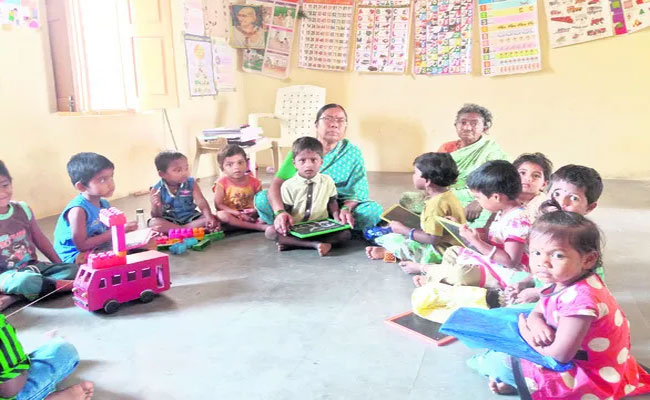 Mahbubnagar Rural education reform   Children receiving pre-primary education in Anganwadi  Nutritious food distribution in Anganwadi center   Government initiative  Anganwadi to pre-primary education  Pre-primary education initiative in rural Anganwadi  