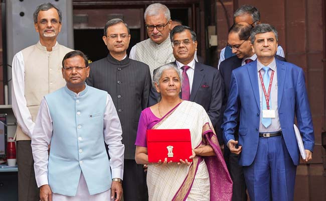 Finance Minister Nirmala Sitharaman presenting the Union Budget 2024-25  Parliament session for the Union Budget presentation Narendra Modi government presenting the Union Budget for the financial year 2019-20  Budget presentation for 2020-21 by the Narendra Modi government  Nirmala Sitharaman to Present Budget for a Record Seventh Time in a Row