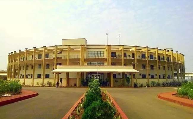 Law University in Chhattisgarh Introduces Menstrual Leave Policy  Hidayatullah National Law University campus  Notice about period leave policy at HNLU Health Shield program announcement at HNLU HNLU students receiving information about new leave policy Hidayatullah National Law University   