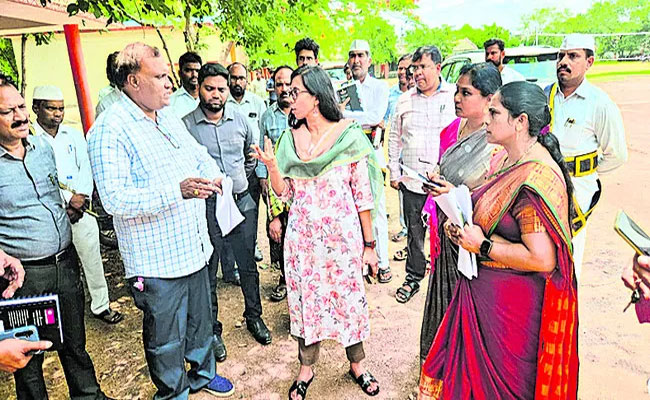 Collector Inspection  Local school headmaster being questioned by Collector Nagalakshmi about student and teacher numbers  