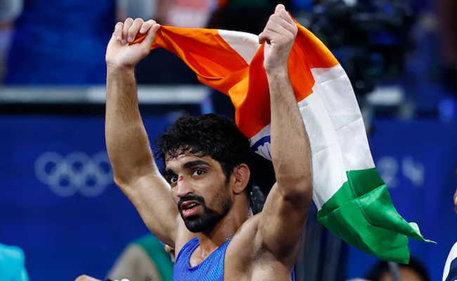 India's first medal in wrestling in Paris Olympics 2024 Indian wrestler Aman Sehrawat with his Olympic medal, celebrating India's sixth medal at the Paris 2024 Olympics 