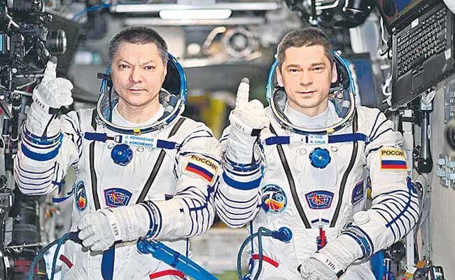 Oleg Kononenko and Nikolai Chub on the International Space Station  Russian Cosmonauts Smash Record for Longest Stay on ISS  International Space Station with cosmonauts Kononenko and Chub  