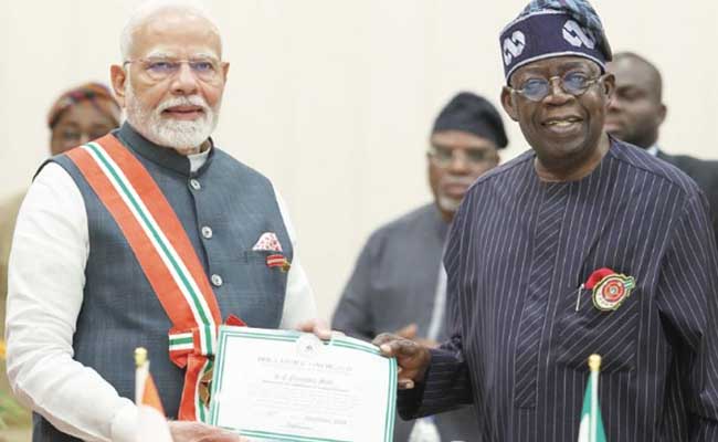 PM Narendra Modi Receives 17th International Award in Nigeria  Prime Minister Modi receiving Nigerias Grand Commander of the Order of the Niger award