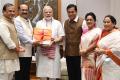PM Modi receives copy of the Assamese Dictionary Hemkosh in Braille