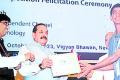 Student Govardhan Naidu receiving certificate