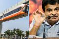 Fast Sky Bus Traveling at 100 km/h,  Nitin Gadkari Test Rides Sky Bus, Eco-Friendly Sky Bus in the City, Sky Bus in Urban Landscape, 