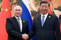 Vladimir Putin meets Xi Jinping in China