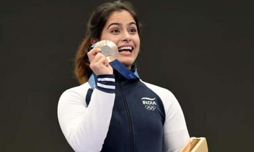 Manu Bhaker competing at the Tokyo Olympics  Manu Bhaker representing India at the Tokyo Olympics  Manu Bhaker's Inspirational Journey: From UPSC Aspirations to Olympic Glory!