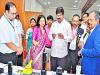 VC Prasad Reddy and other officers watching show