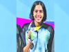Female swimmer Vriti Agarwal celebrates her 200m freestyle bronze win, Athlete Vriti Agarwal with her bronze medal in swimming competition, Vritti clinches Bronze in National Games,Telangana's Vriti Agarwal at the podium with her bronze medal, 