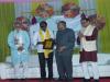 Vijay Kumar receiving an award for his works    Satvik Traditional Food Festival