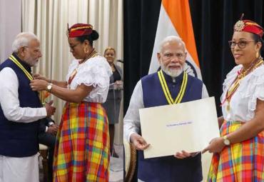 PM Modi conferred with Dominica’s highest National Award  Prime Minister Modi receiving the Dominica Award of Honour from President Silvani Burton  